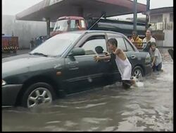 Nine dead in flooding from storm News Clip