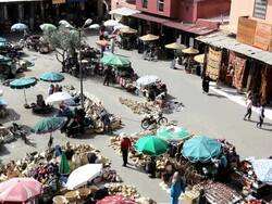 People shopping in a market square in Marrakech, Morocco, Africa Stock Footage