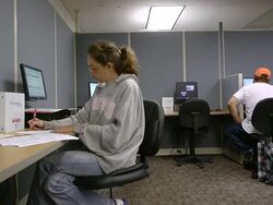 MS Job seeker woman filling out forms at state run job center / Jackson, Michigan, United States  Stock Footage