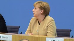 German leader condemns religious violence, says Greeks must meet bailout terms News Clip