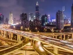 T/L WS HA ZO Night Traffic at a Road Intersection / Shanghai, China Stock Footage