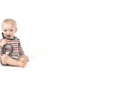 Baby boy searching magnifying glass Stock Footage