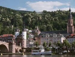 WS View of River Neckar, Alte Brucke (Old Bridge) and Heiliggeistkirche (Church of the Holy Spirit) / Heidelberg, Baden-WÃƒÂ¼rttemberg, Germany   Stock Footage