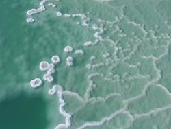 Aerial Dead Sea salt formations, view downwards, southern Judea Desert Stock Footage