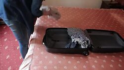 Young woman unpacking the bag. Stock Footage