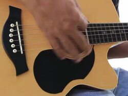 Playing the acoustic guitar Stock Footage
