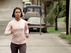 MS PAN Woman jogging / Portland, OR, USA Stock Footage