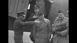 US General Ernest Harmon, Commanding General XXII US Corps, at airfield in Berlin after end of World War II News Clip
