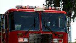 Firefighter truck with flashing lights Stock Footage