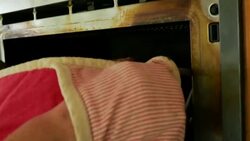 Roast Leg of Lamb taken out of oven Stock Footage