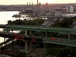 LOW AERIAL, Maurice J. Tobin Memorial Bridge at sunset, Boston, Massachusetts, USA Stock Footage