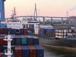 CU Shot of unloading containers in container ship on container terminal in harbour / Hamburg, Germany Stock Footage