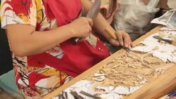 Hand of carver carving wood Stock Footage