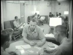 U.S. sailors relax in a lounge on the U.S.S. Kitty Hawk . News Clip