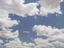 T/L African clouds - classic white African clouds against blue sky, Kalahari, South Africa Stock Footage