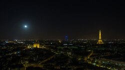 Moonrise over the City, Eiffel Tower and  Arc de Triomphe, Paris, France, Europe - Time lapse Stock Footage