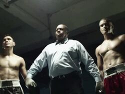 Boxing champion, defeated boxer and referee Stock Footage