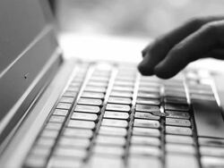 Typing On Laptop Keyboard Stock Footage