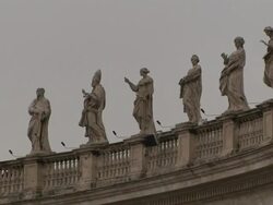 Sculptures of saints line a railing at St. Peter's Basilica. Stock Footage