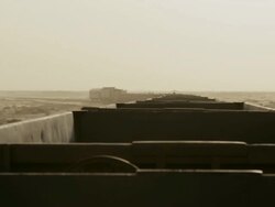 Mauritanian train from car perspective Stock Footage