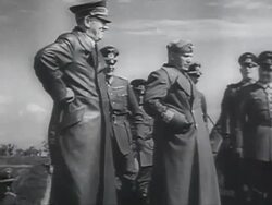 MS Adolf Hitler and Benito Mussolini inspecting destroyed Soviet armaments, fighting equipment , flower in ruins, empty cartridges helmet in Brest-Litovsk AUDIO / Russia Stock Footage
