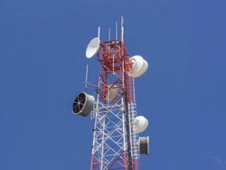 Telecommunication Tower with blue skies and clouds,Timelapse Stock Footage