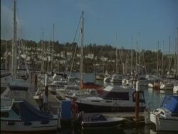 MS pan right across boats moored in Dartmouth and Kingswear yacht marina, Devon, England Stock Footage