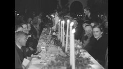 Franklin Roosevelt carves Thanksgiving turkey at the Georgia Warm Springs Foundation News Clip