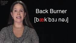 Idiom "Back Burner" -- How to Use and Pronounce -- American English Instructional Video