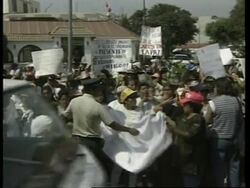 PERU: LIMA: DEMONSTRATION CALLING FOR PEACEFUL END TO EMBASSY SIEGE News Clip