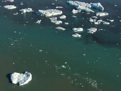 WS AERIAL View of Jokulsarlon icebergs / Iceland Stock Footage
