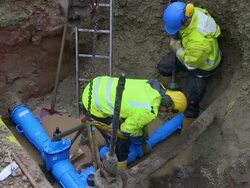 MS Workmen repairing water pipes in street / Konz, Rhineland-Palatinate, Germany Stock Footage