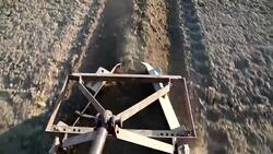 Cultivation through Tractor in the field Stock Footage