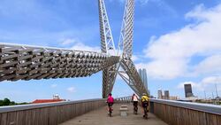 Oklahoma City Oklahoma OKC City scape and the new Sky Dance Bridge over Expressway with skyline Stock Footage