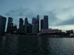 MS POV Shot of futuristic city buildings form boat / Singapore Stock Footage