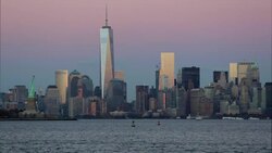 Statue of Liberty, One World Trade Center and Downtown Manhattan across the Hudson River, New York, Manhattan, United States of America Stock Footage