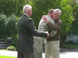 WS Father and Granfather in Uniform Greeting Soldier Son Returning Home from Military Service / Richmond, Virginia, United States Stock Footage
