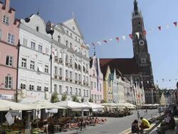WS View of Street Cafes in decorated Old town with St. Martin basilica with tallest brick tower in the world / Landshut, Bavaria, Germany Stock Footage