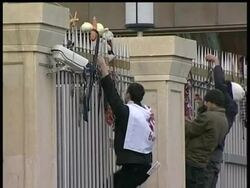 Thousands marched in front of parliament in Georgia demanding the president resign. They hung neckties on his fence in reference to when he was caught chewing his tie while waiting for an interview last year. Instructional Video