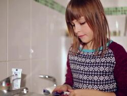 girl brushing his teeth. Stock Footage