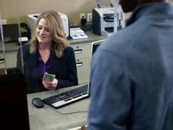 Man depositing cash in bank Stock Footage
