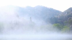 Wet fog moving over Seryangji lake(Reservoir in the Hwasun) Stock Footage