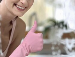 HD DOLLY: Housecleaner Showing Thumb Up Stock Footage