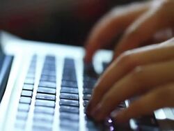 Woman using laptop Stock Footage