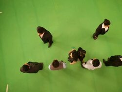 Business people forming alphabet K Stock Footage