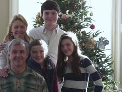MS Family portrait in front of Christmas tree / Rutland,Vermont, USA Stock Footage