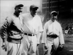 B/W 1927 Babe Ruth standing between Ty Cobb and Eddie Collins in stadium / newsreel Stock Footage