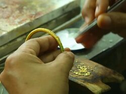 HD:Goldsmith working with a unfinished work. Stock Footage