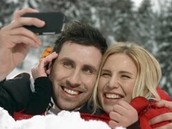 HD Super Slow-Mo: Couple Self Photographing In The Snow Stock Footage