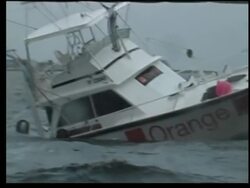 Damage along seaboard, listing boats, flooded streets; roofs blown off News Clip